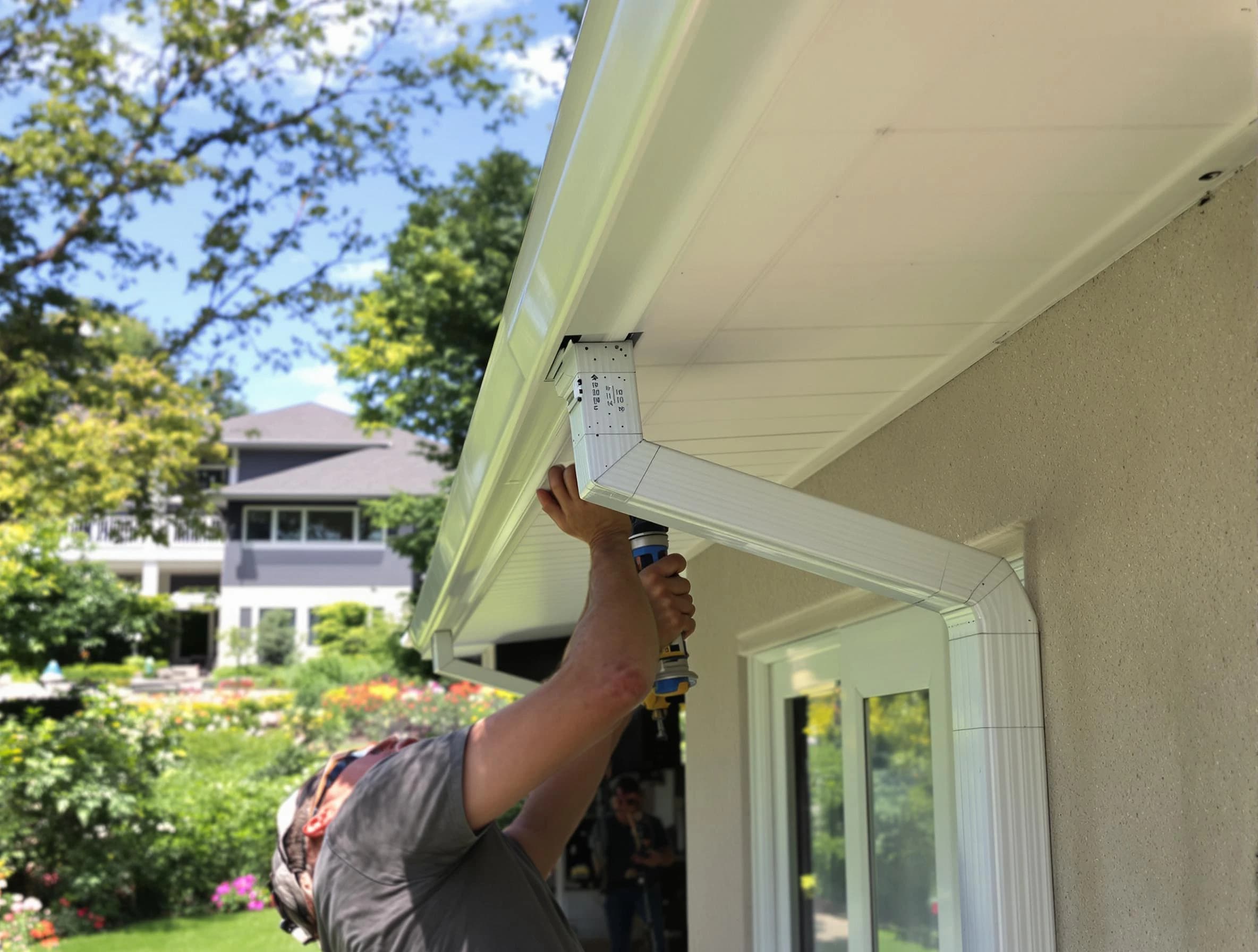 Solon Roofing Company technicians performing gutter installation in Solon, OH